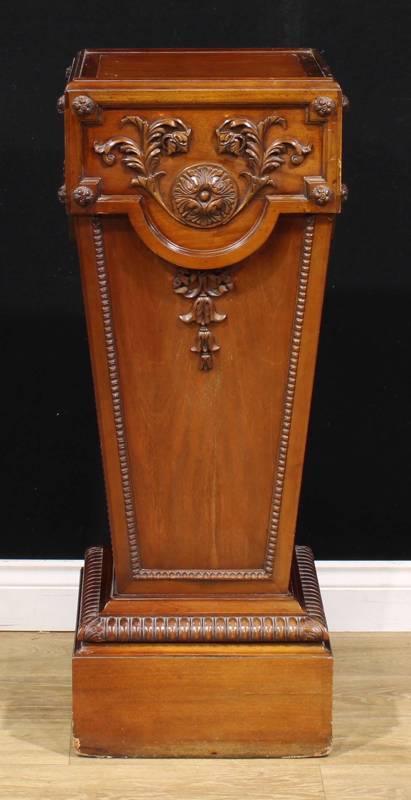An Adam style mahogany statuary pedestal, carved and applied with bosses, leafy scrolls and bell - Image 2 of 3