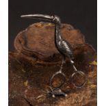 A pair of silver novelty ribbon threaders, cast as a stork, 10cm long, Theodor Hartmann, London 1897