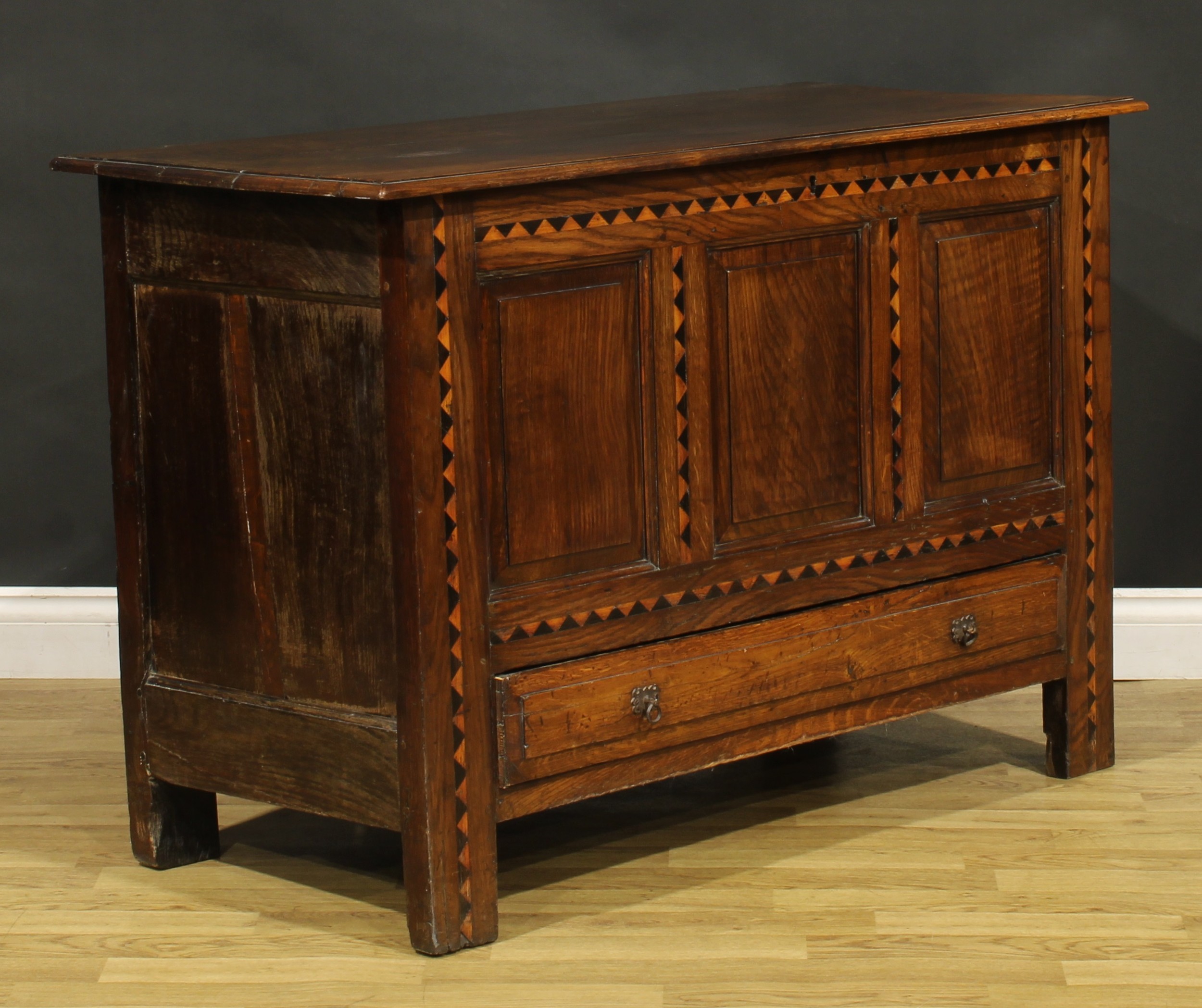 An 18th century design oak mule chest, hinged top above three raised and fielded panels outlined - Image 2 of 5