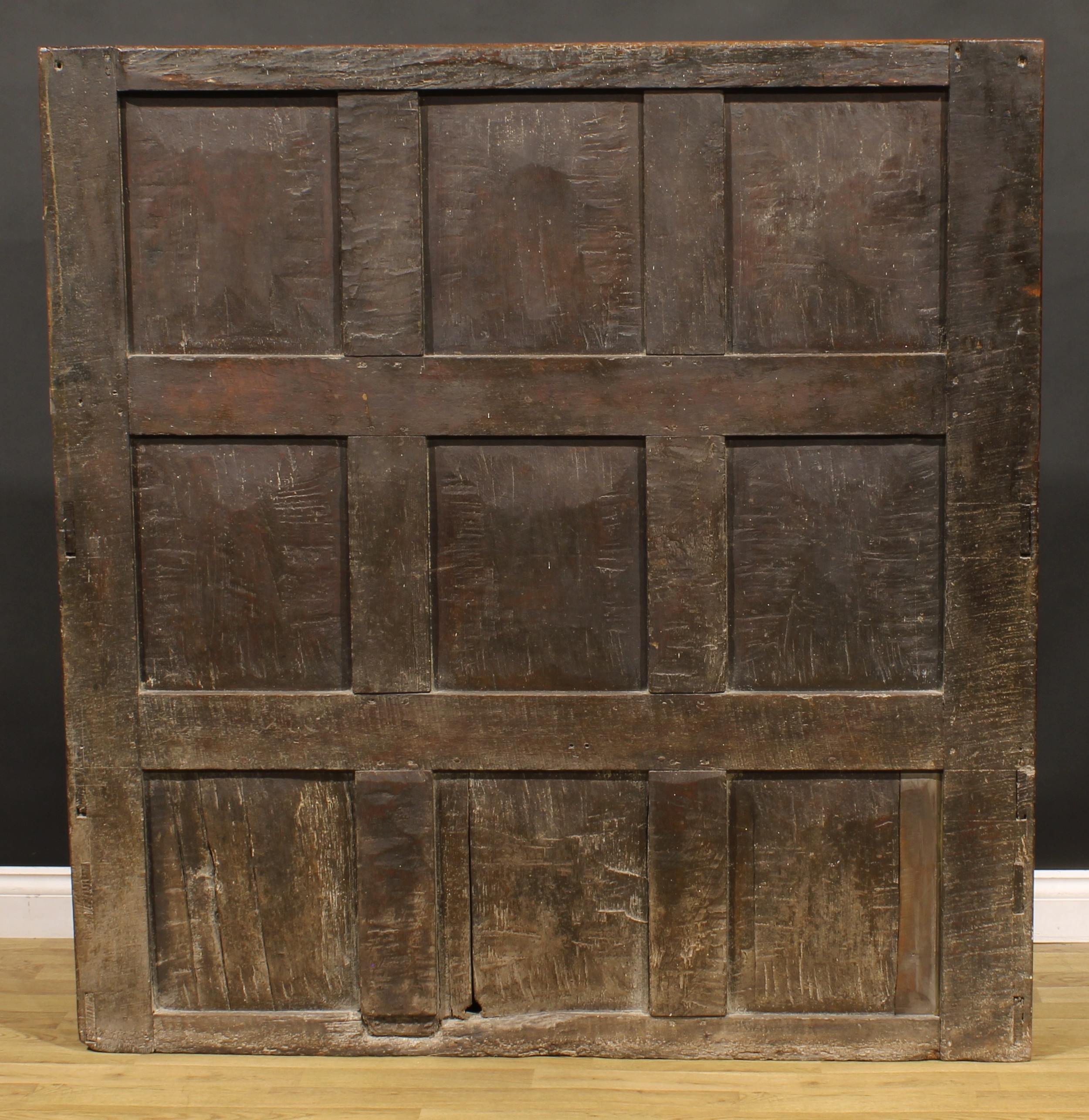 An 18th century oak box settle, rectangular panel back, hinged seat, 147cm high, 140cm wide, the - Image 4 of 4