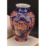 A Japanese ovoid vase, painted in the Imari palette, 24.5cm high, Meiji period