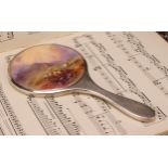 A Royal Worcester mounted silver hand mirror, the plaque painted by Harry Stinton, signed, with