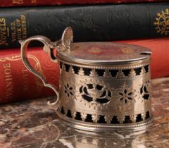 A Victorian silver oval mustard, of George III Neo-Classical design, pierced and bright-cut engraved