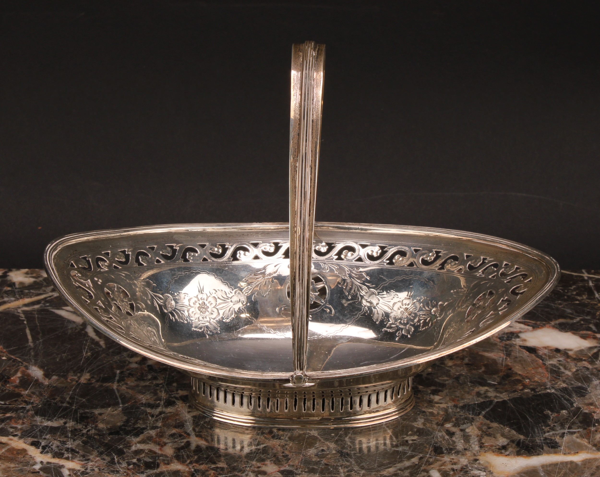 An Edwardian silver navette shaped swing-handled sweetmeat dish, pierced and bright-cut engraved - Image 2 of 5