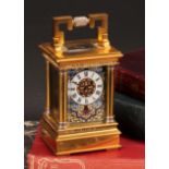 A French parcel-silvered gilt brass and champleve enamel miniature carriage timepiece, 3cm clock
