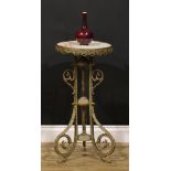 An early 20th century French brass and onyx tripod guéridon or plant stand, circular top, the