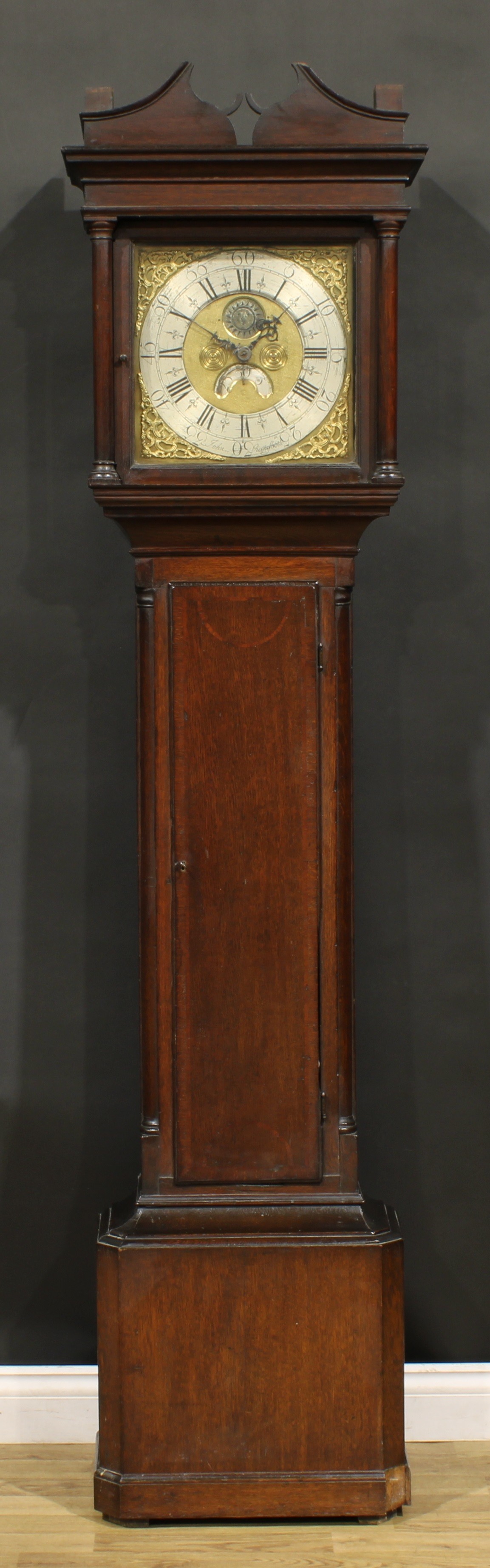 A George III oak longcase clock, 30.5cm square brass dial with silvered chapter ring inscribed