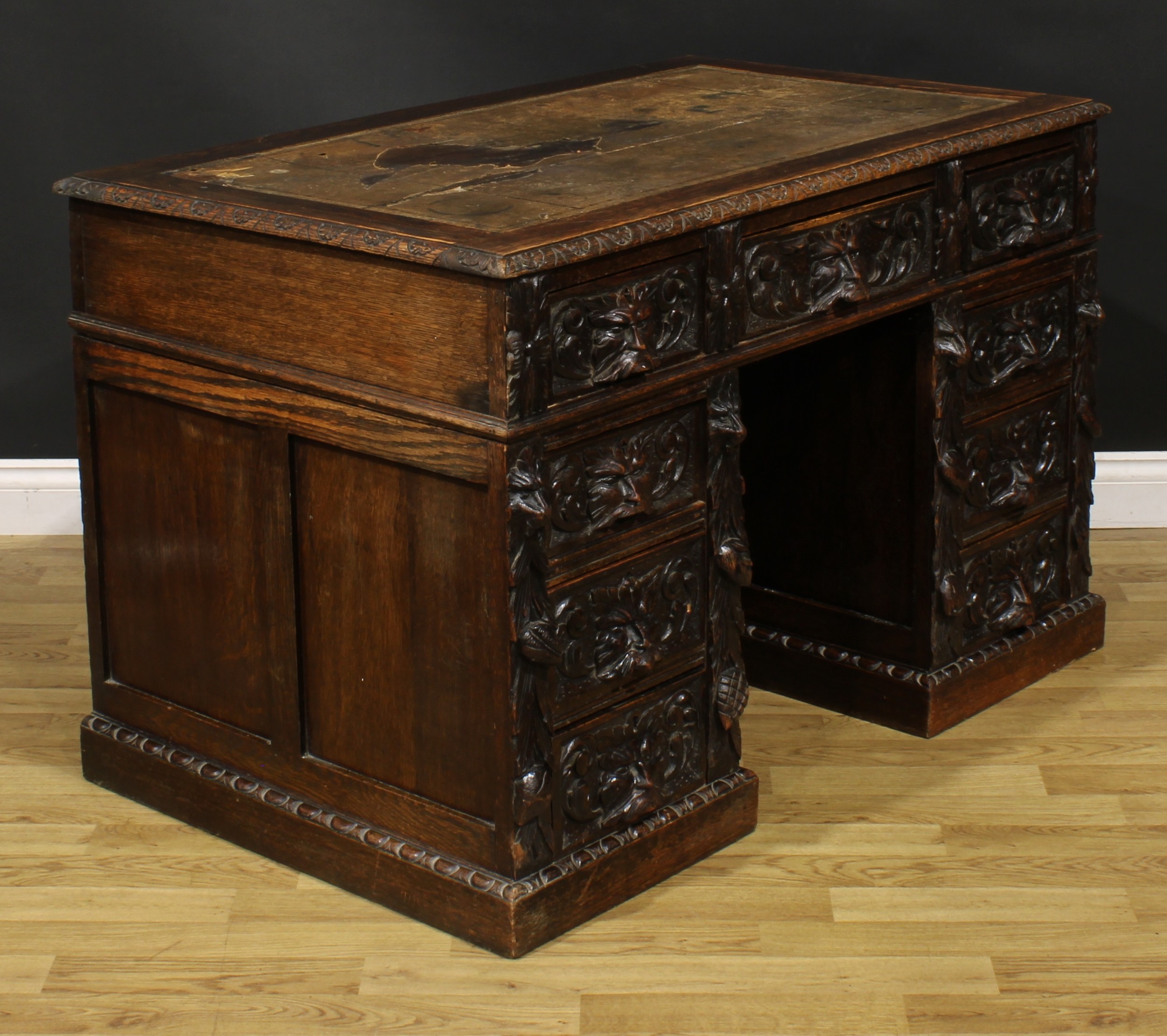 A late Victorian oak twin pedestal desk, rectangular top with foliate carved edge and inset - Image 3 of 6