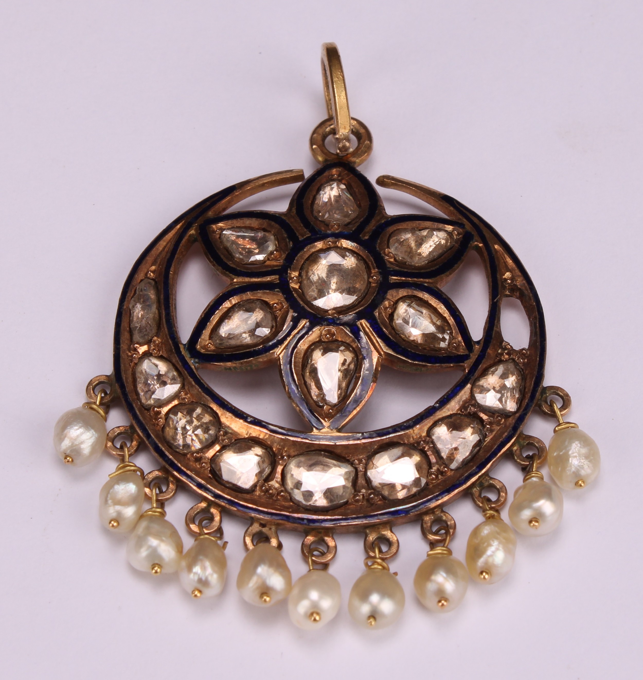 An unmarked Indian gold pendant set with a starburst arrangement of old cut diamonds, above a - Image 2 of 3