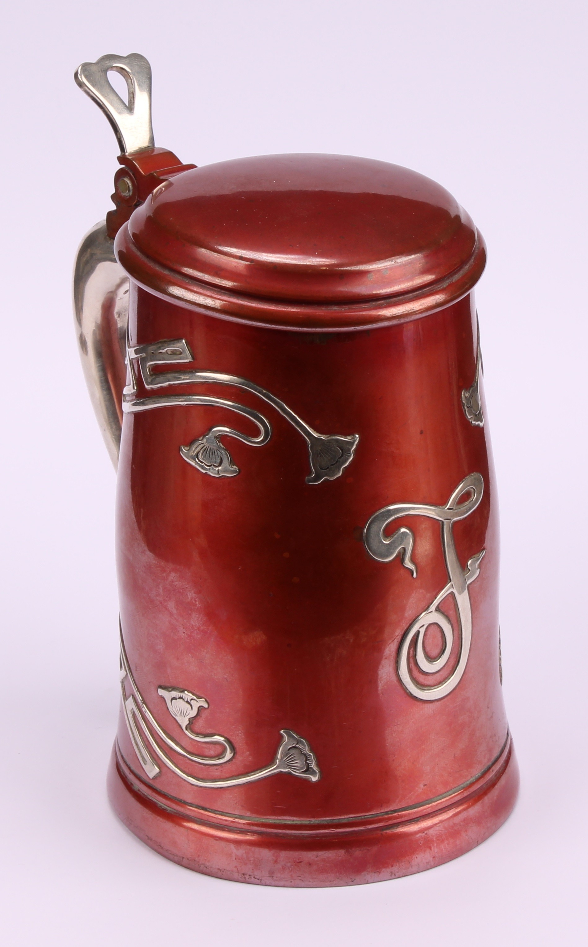 An American Art Nouveau silver overlaid mixed metal tankard, applied with stylised flowers and - Image 3 of 6