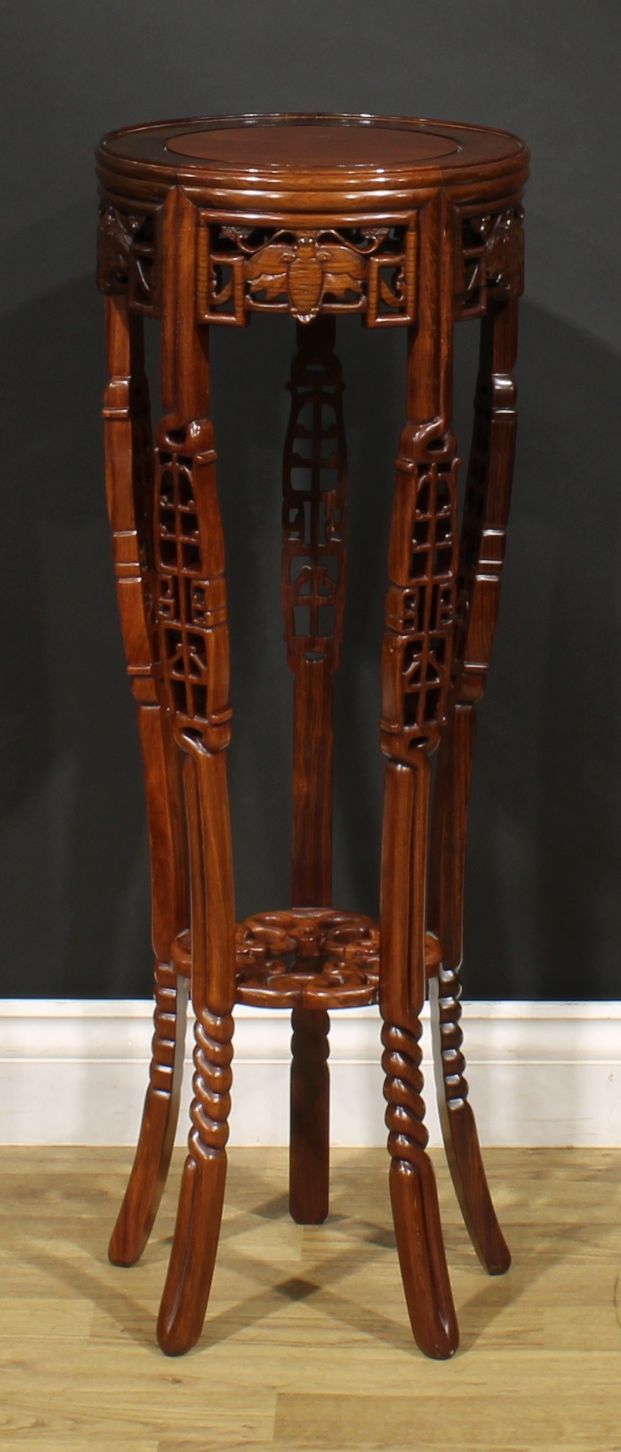 A Chinese hardwood jardiniere stand, pierced and carved with bats and scrolls, 87cm high, 30.5cm - Image 3 of 3