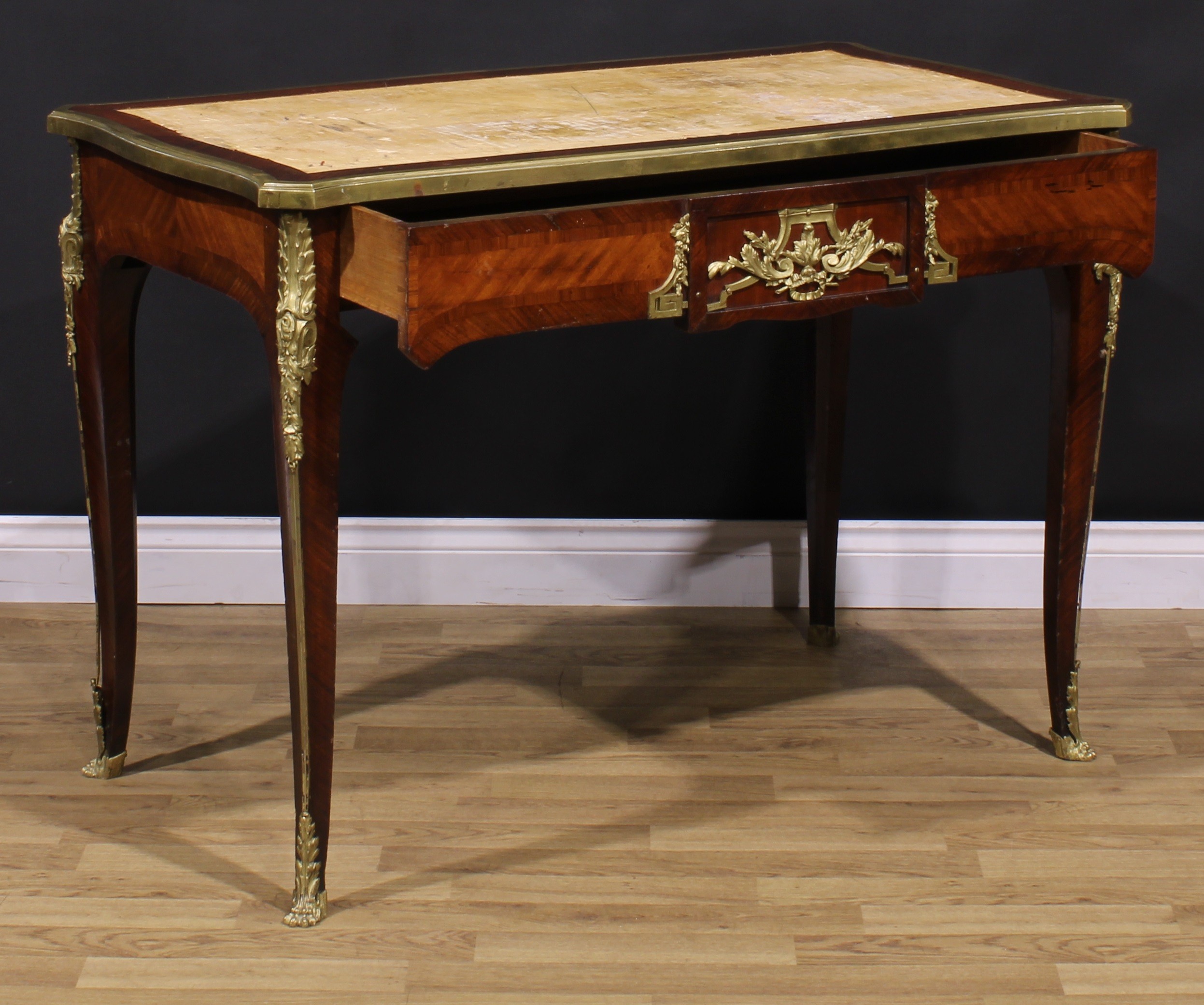 A French Louis XV Revival gilt metal mounted rosewood and kingwood bureau plat, slightly oversailing - Image 4 of 6