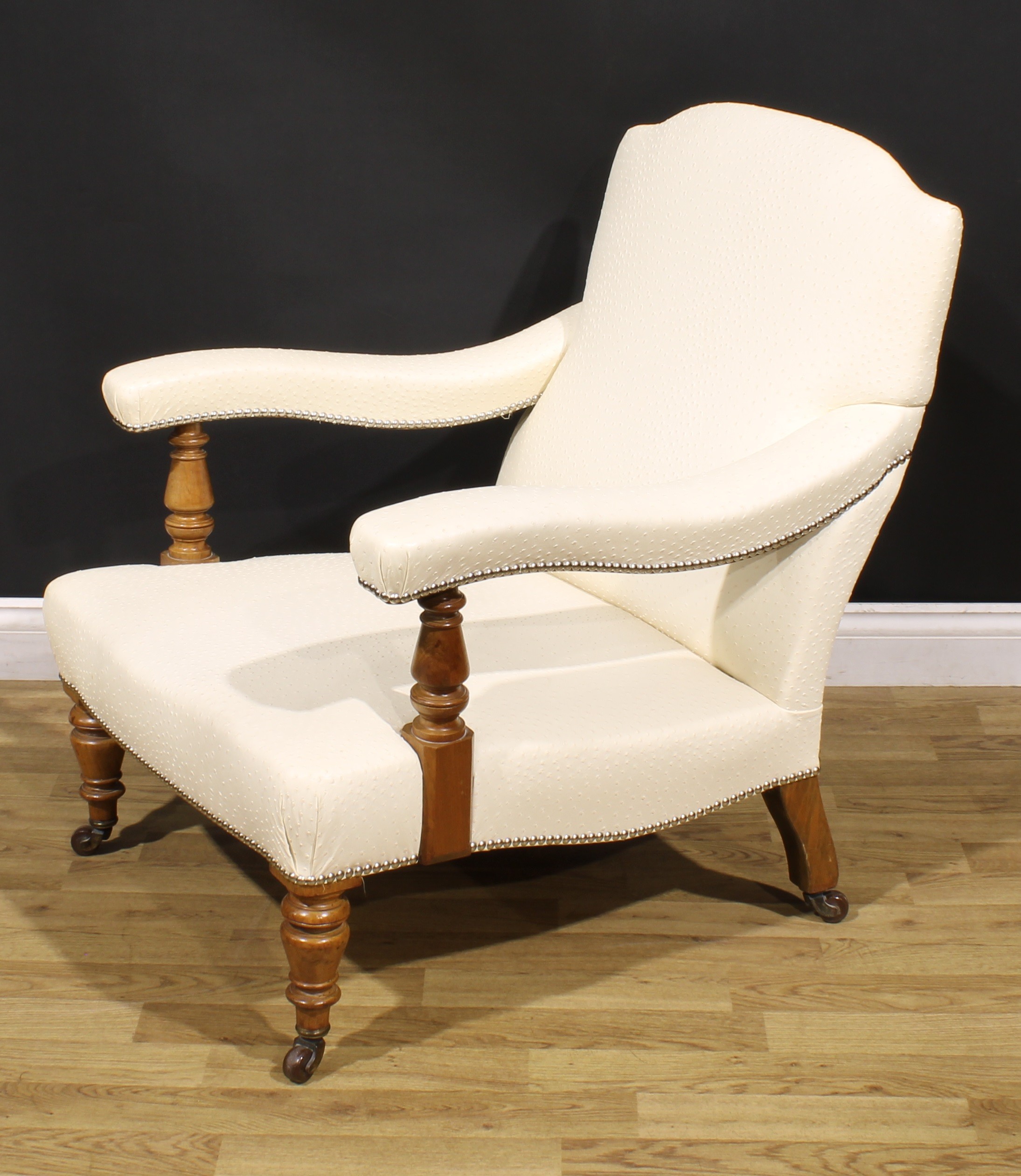 A Victorian walnut easy chair, in the manner of Howard & Sons, stuffed-over ostrich hide upholstery, - Image 3 of 4