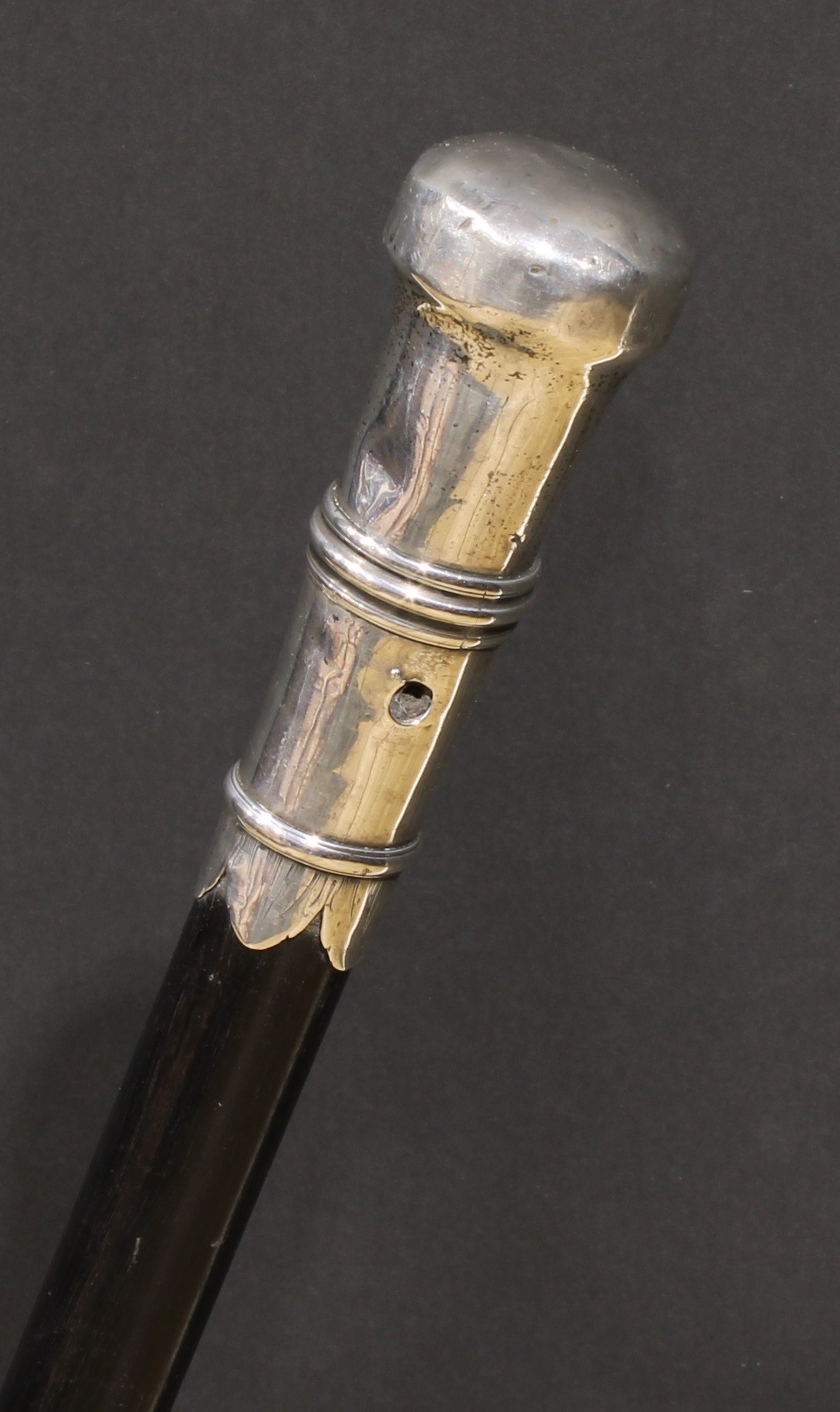 A Queen Anne/George I silver walking cane handle, of traditional 'ivory and pique' design, inscribed