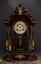 A late 19th century American mirror-side Occidental clock, Eight Day Triumph Strike, by The