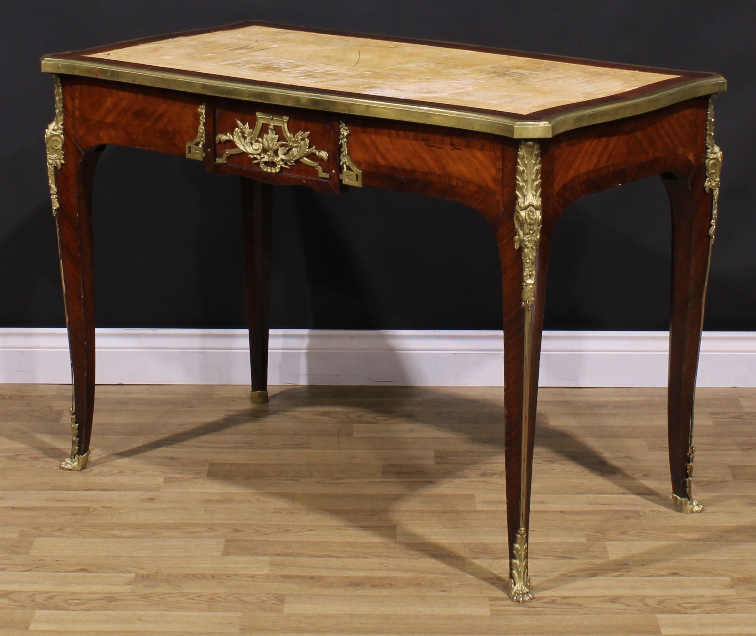 A French Louis XV Revival gilt metal mounted rosewood and kingwood bureau plat, slightly oversailing - Image 5 of 6