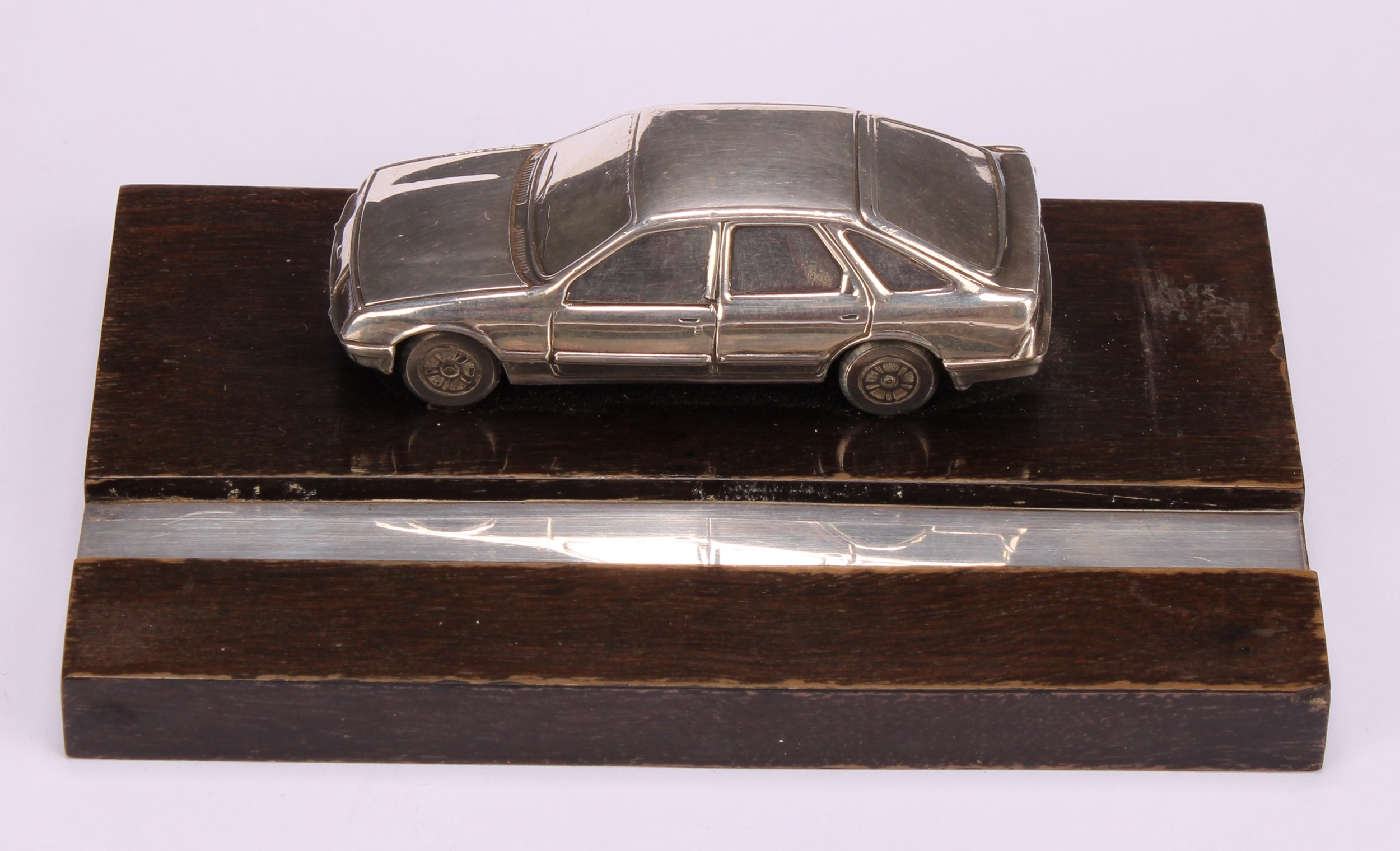 Automobilia - an Elizabeth II silver mounted desk stand, applied with a cast model of a Ford Sierra, - Image 2 of 4