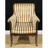 A George IV mahogany library chair, cane back, stuffed-over upholstery, turned forelegs, brass