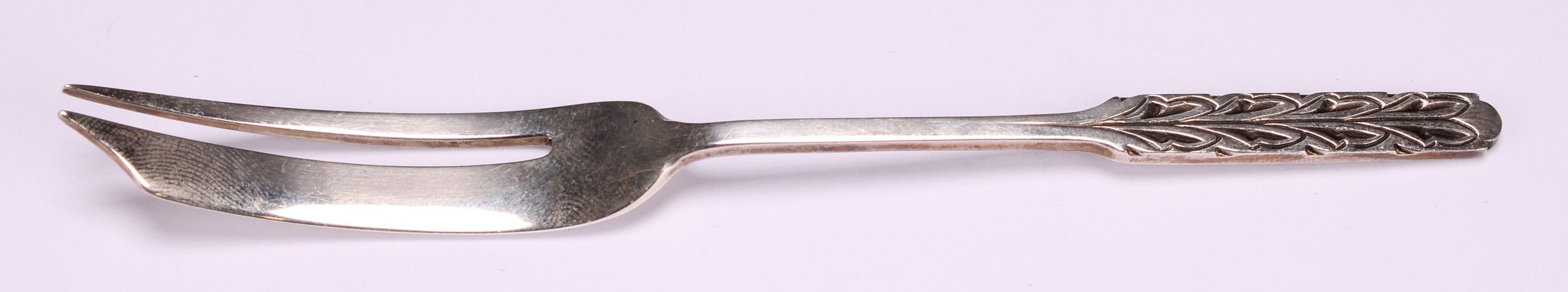 Liberty & Co - a set of six Arts and Crafts silver pastry forks, the terminals chased with - Image 2 of 4