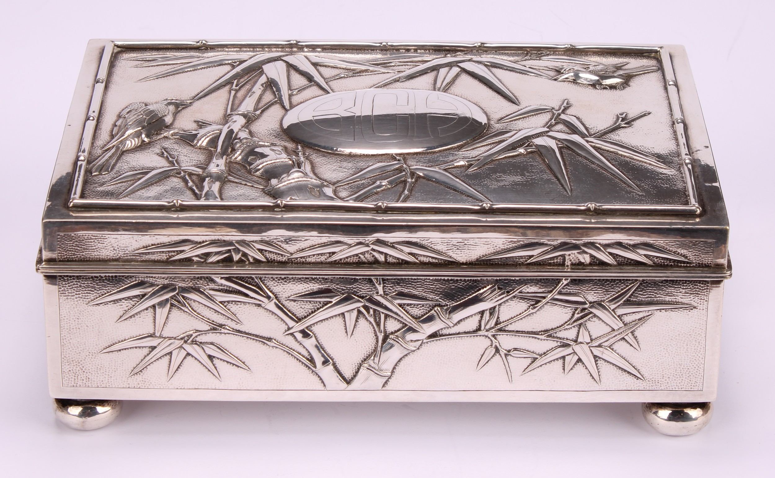 A large Chinese silver rectangular cigar box, chased with birds amongst leafy bamboo, hinged - Image 2 of 5