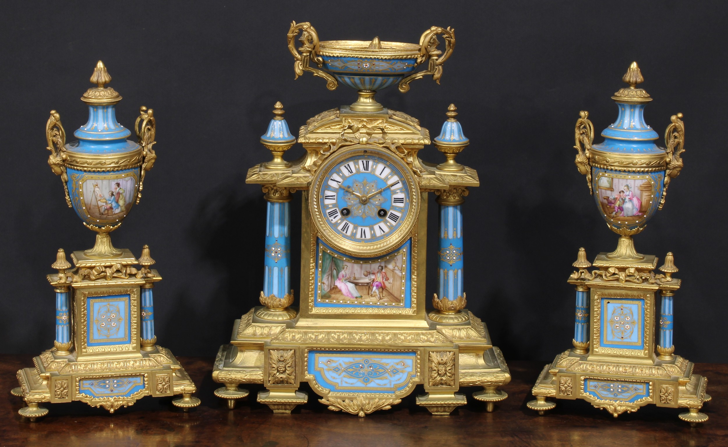 A 19th century French ormolu and porcelain clock garniature, in the Louis XVI Revival taste, 9cm