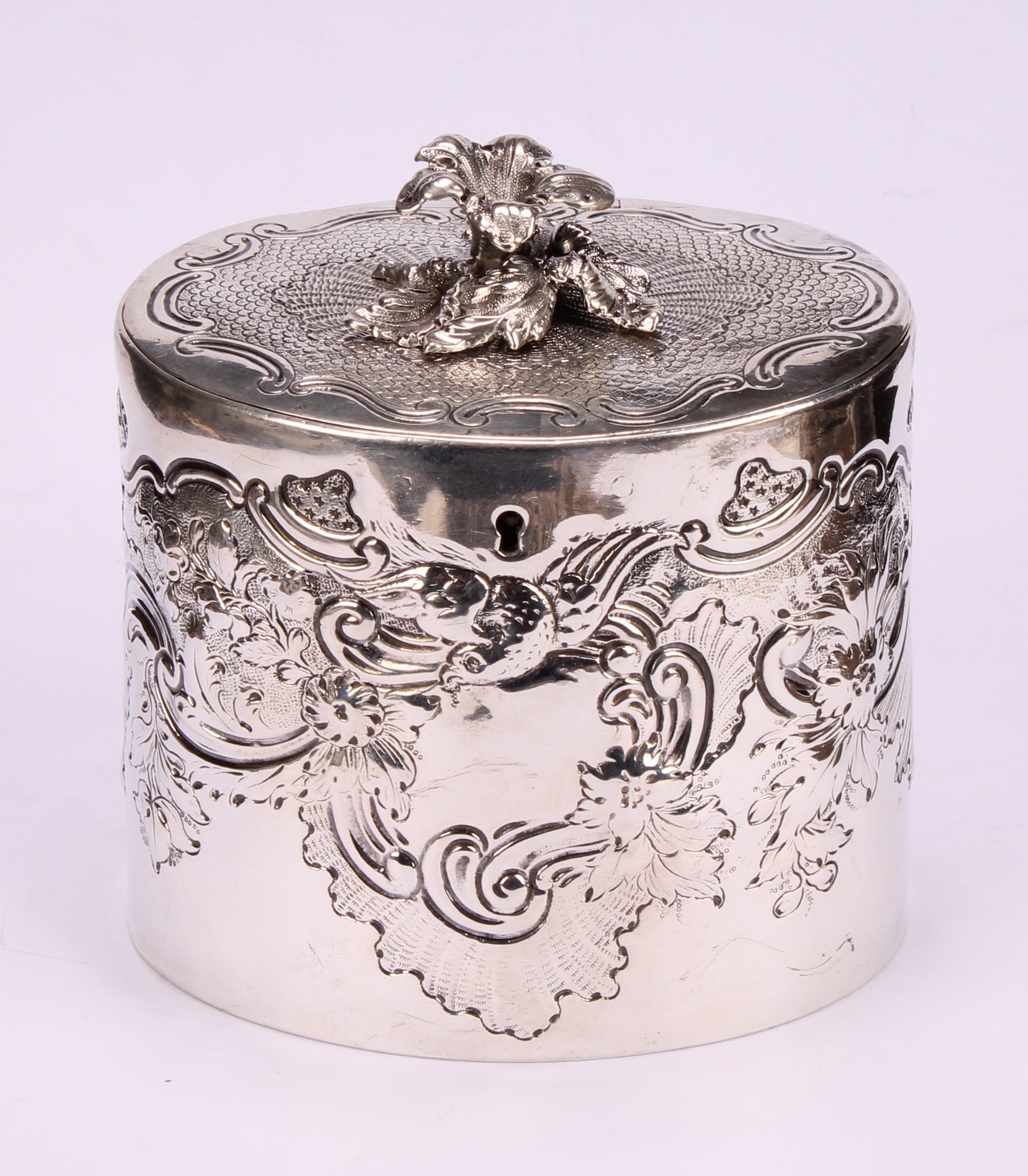 A George III oval tea caddy, chased with birds, flowers and scrolling leaves, flush-hinged cover - Image 2 of 5