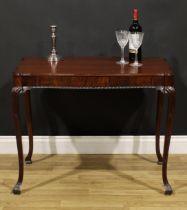 A George II Revival Irish mahogany silver table, serpentine rectangular top with moulded edge,