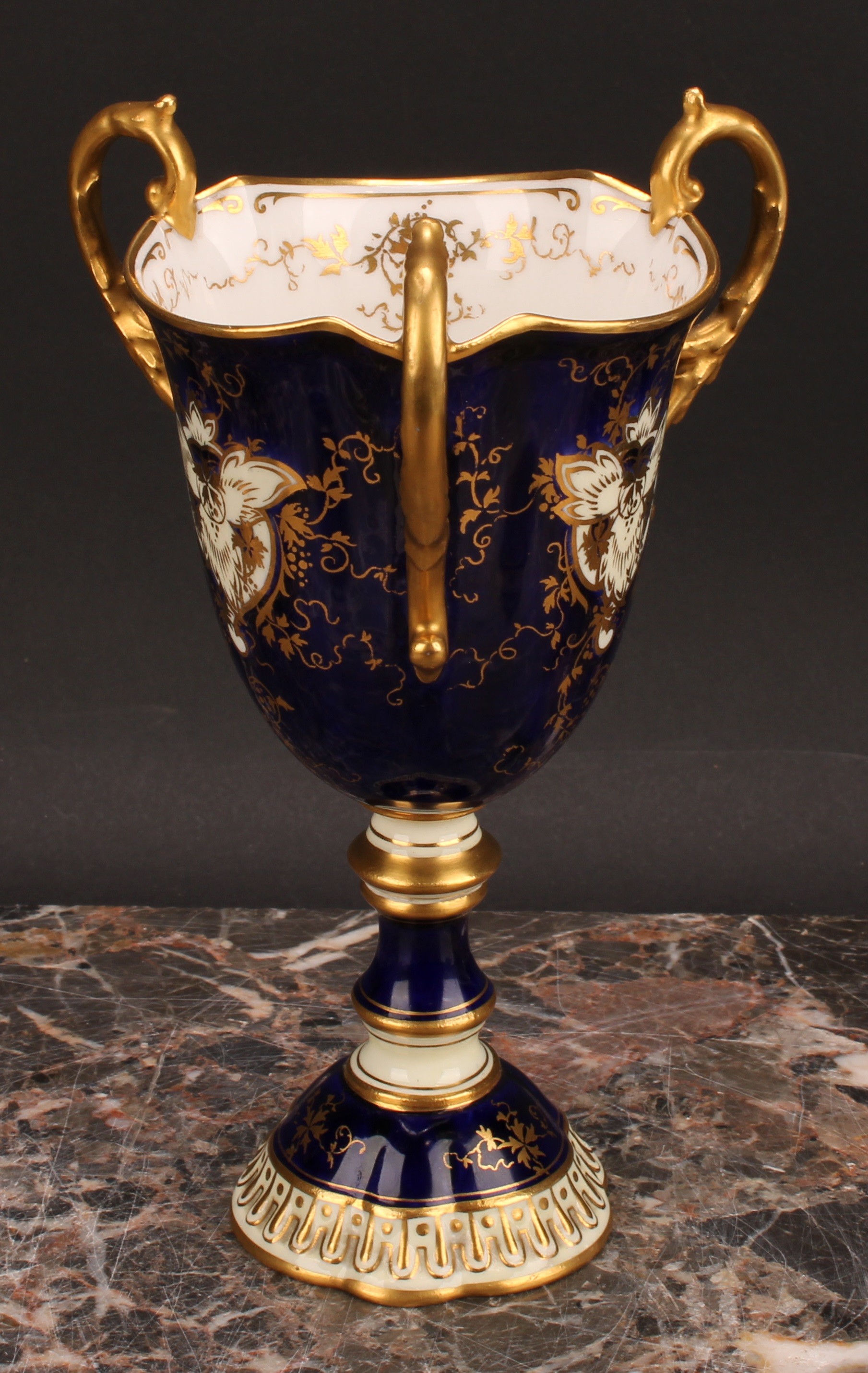 A Coalport three-handled pedestal ovoid cup or vase, painted with a landscape, within an shaped - Image 4 of 5