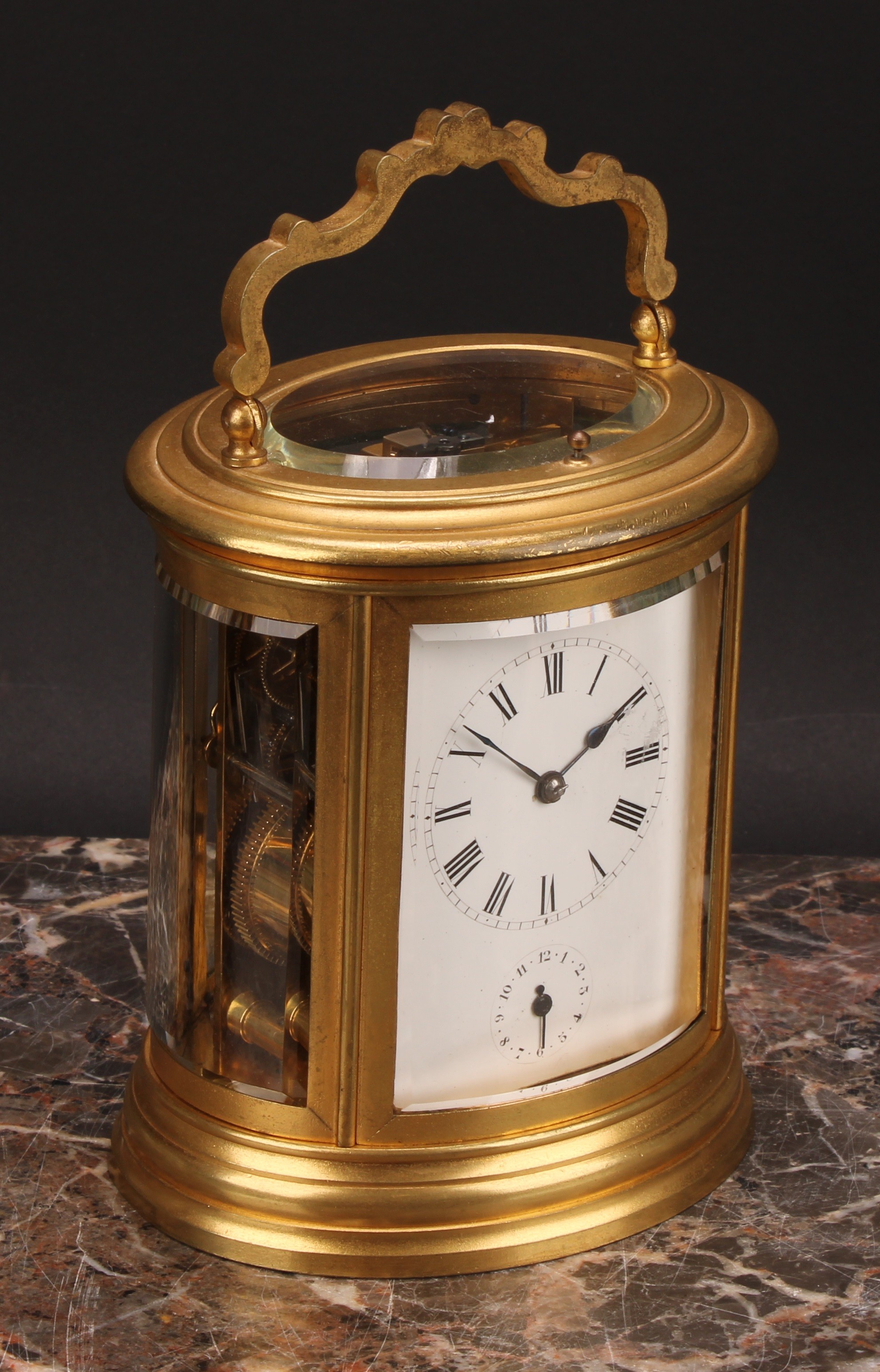 A late 19th century gilt brass oval repeating alarum carriage clock, 7cm enamel dial with Roman - Image 2 of 7