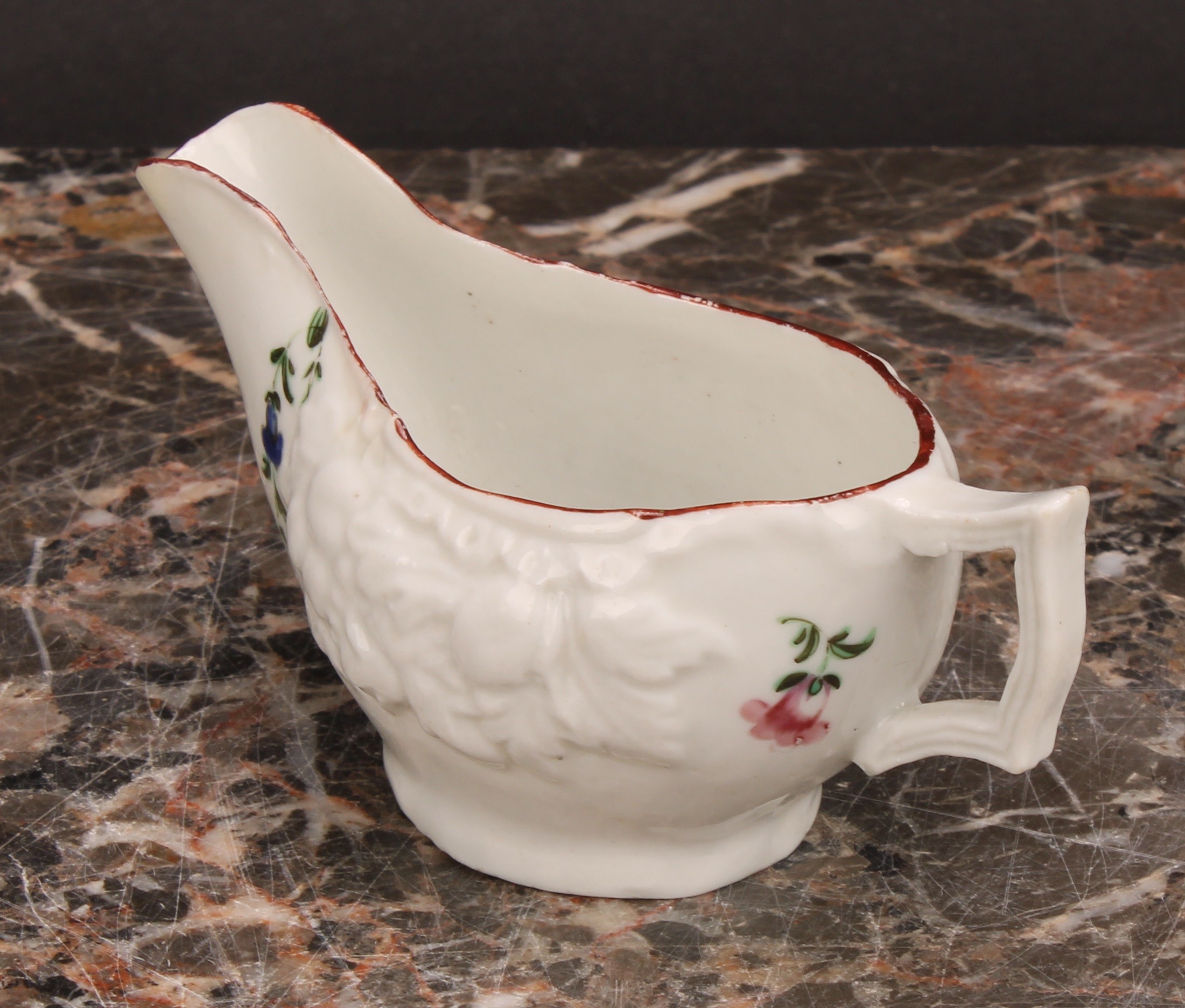 A Cookworthy Bristol butter boat, moulded with fruit, painted with floral swag and sprays, 10.5cm - Image 4 of 5