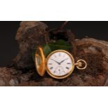 A lady's 18ct gold half hunter pocket watch, white enamel dial, Roman numerals, subsidiary seconds