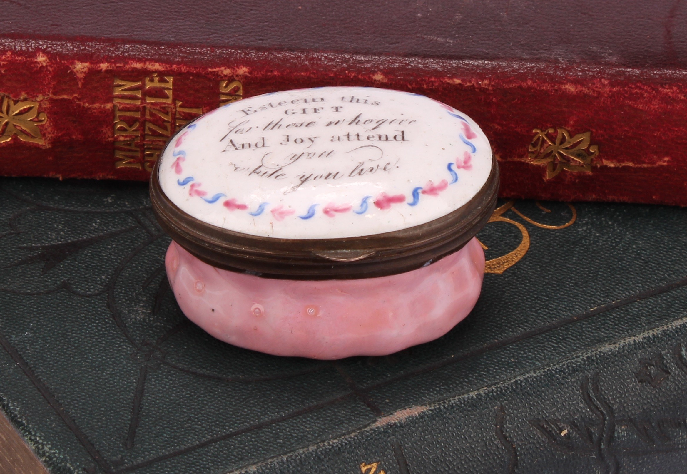 A George III South Staffordshire enamel oval patch box, hinged cover inscribed Esteem This Gift