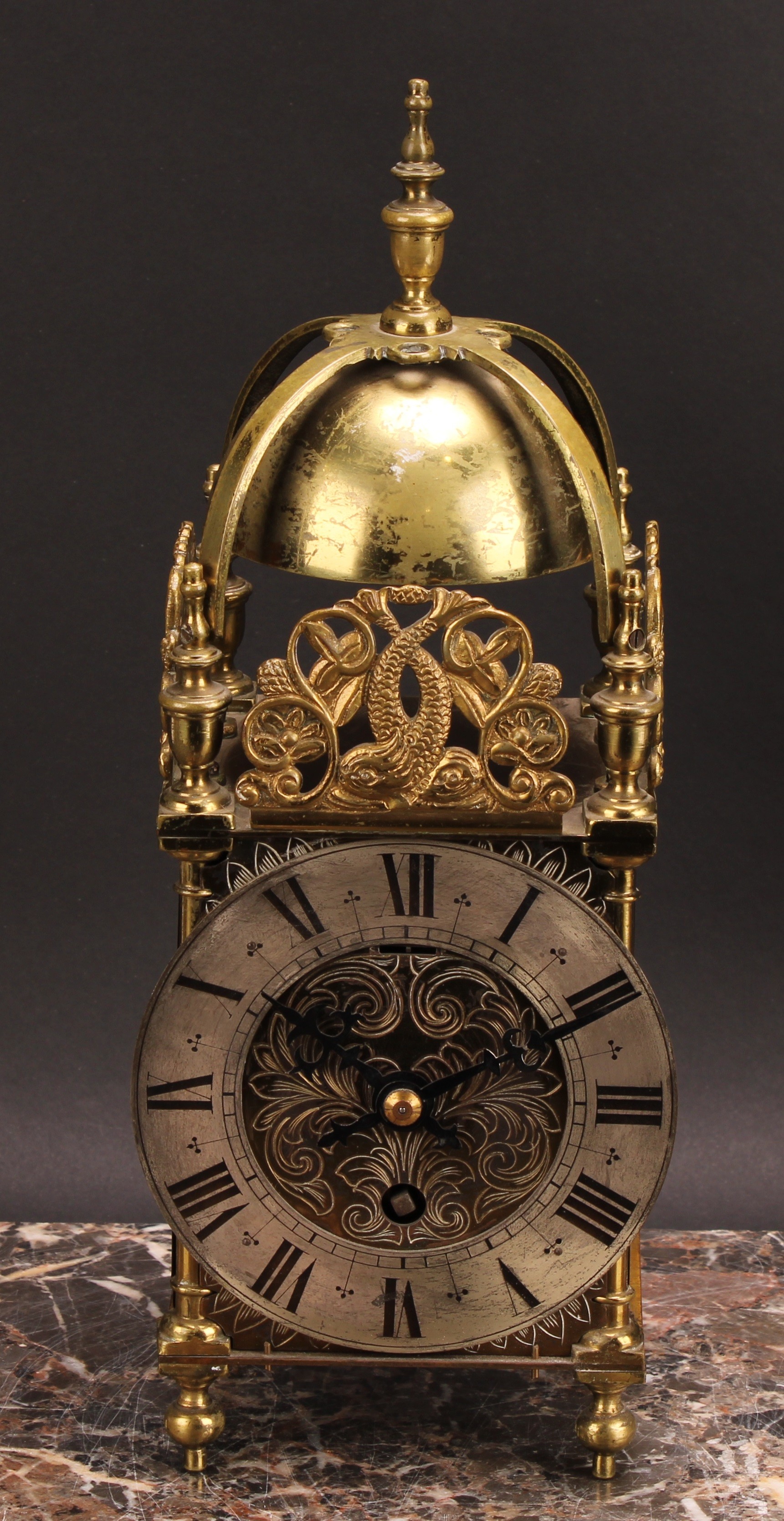 A 17th century style brass lantern timepiece, 11.5cm silvered clock dial inscribed with Roman