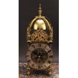 A 17th century style brass lantern timepiece, 11.5cm silvered clock dial inscribed with Roman