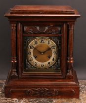 An Art Nouveau mantel clock, 13cm dial inscribed with Arabic numerals, three winding holes, eight