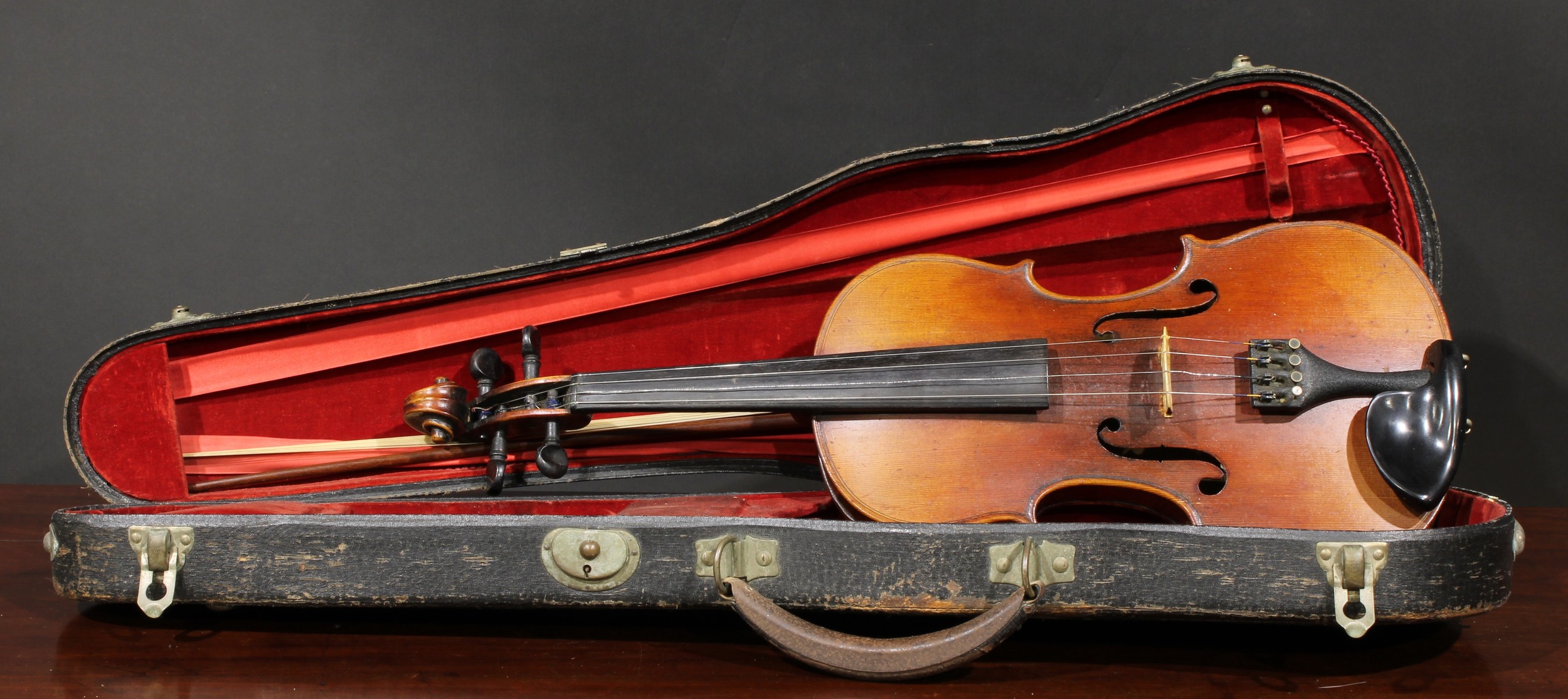 A violin, the two-piece back 36cm long excluding button, Stradiuarius 1721 label, ebonised tuning