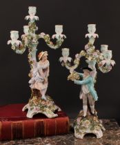 A pair of Sitzendorf figural four-light candelabra, modelled as a courting couple, each painted in