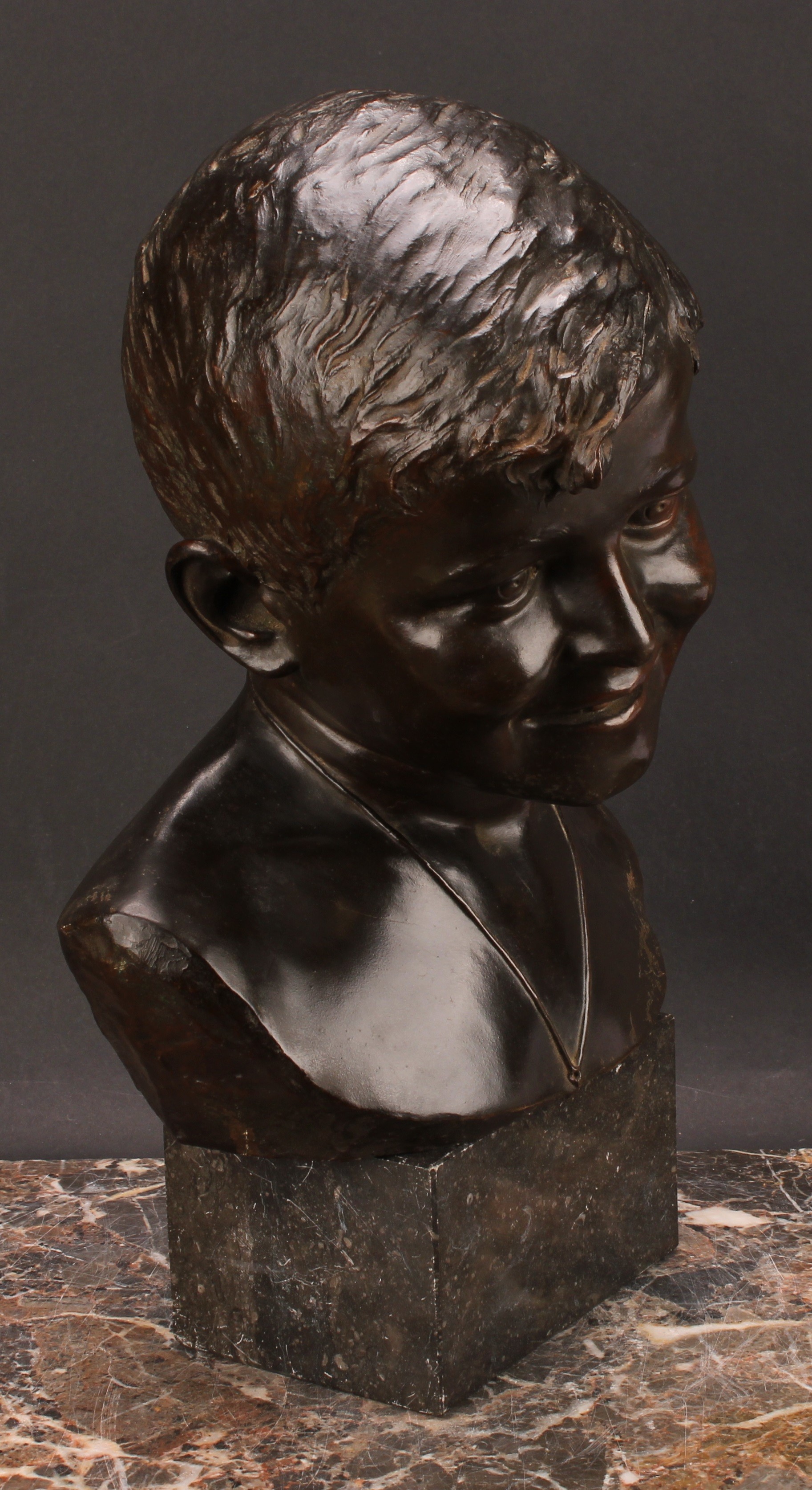 Eduardo Rossi (1867-1926), a brown patinated bronze, bust of a young boy, signed in the maquette, - Image 3 of 5