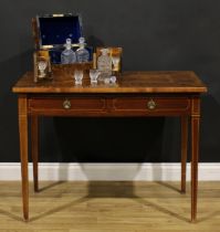 A Sheraton Revival mahogany side table, rosewood crossbanded rectangular top centred by a flame-