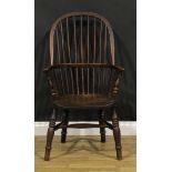 A late 19th century beech, ash and elm Windsor elbow chair, by J. ELLIOTT & SONS, JFS, stamped, hoop