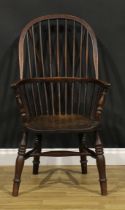 A late 19th century beech, ash and elm Windsor elbow chair, by J. ELLIOTT & SONS, JFS, stamped, hoop