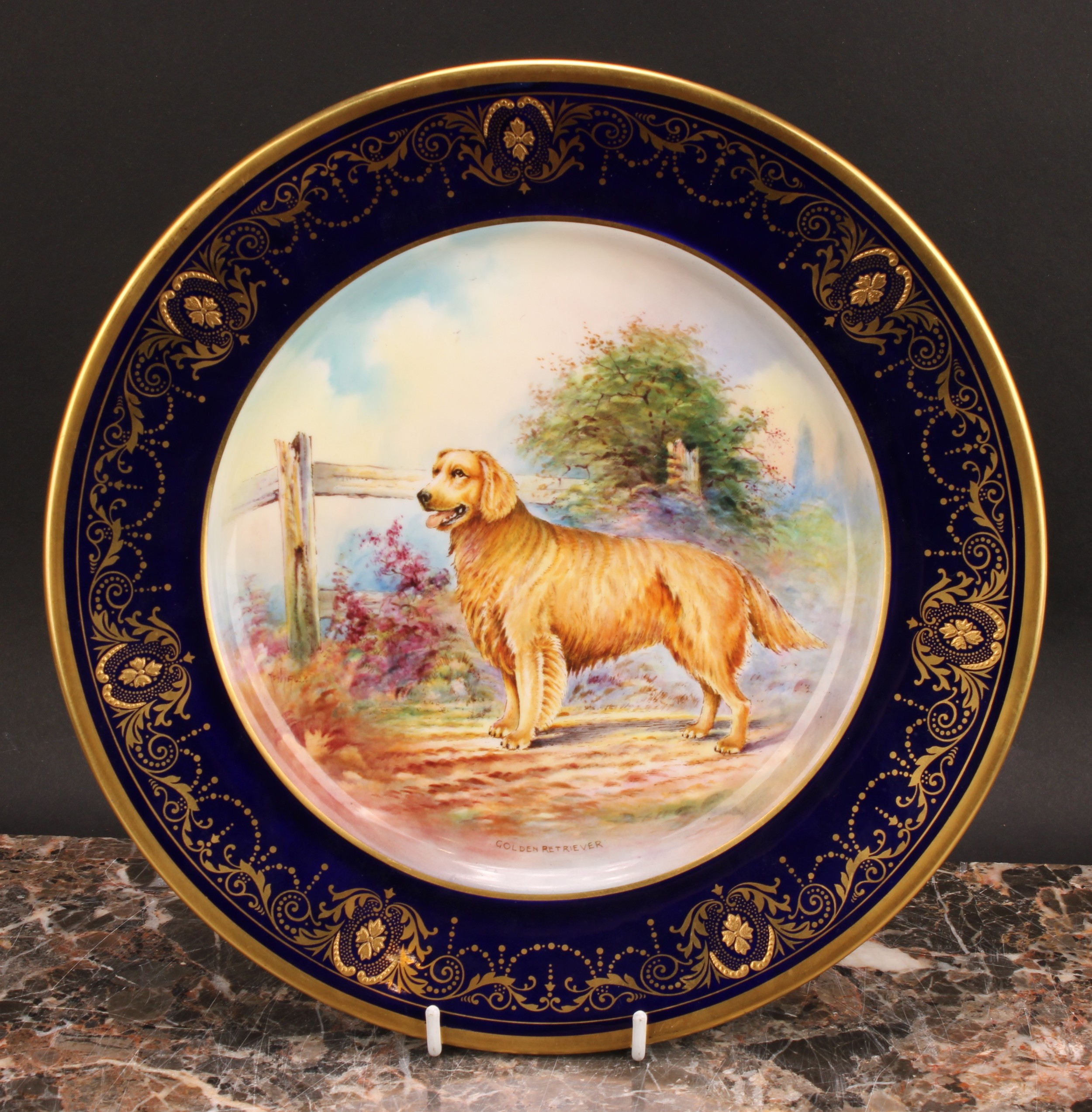 An Aynsley circular plate, painted by J. Shaw, signed to verso, with a Golden Retriever by a - Image 2 of 5