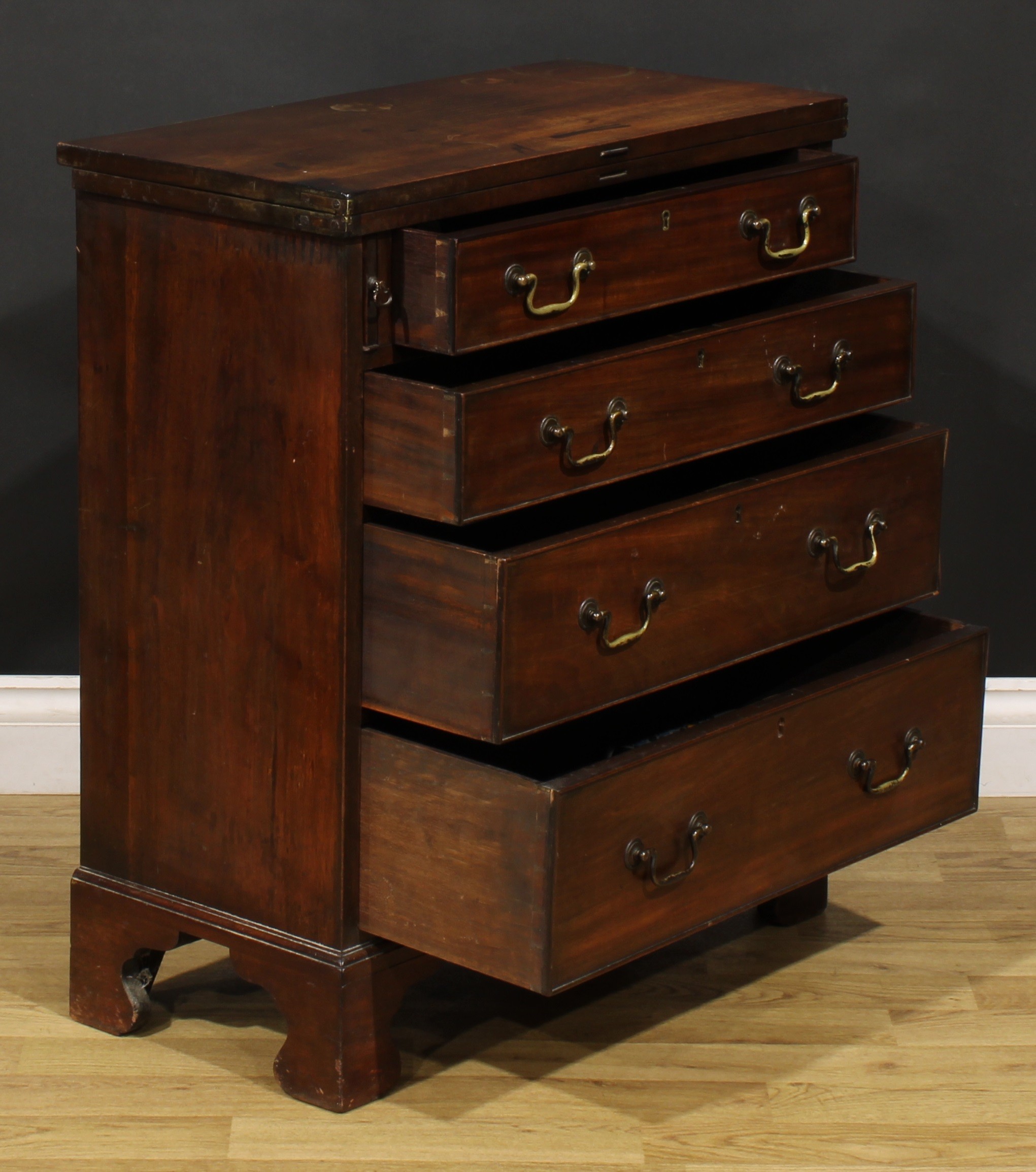 A 19th century mahogany bachelor’s chest, rectangular folding top above four long cockbeaded - Image 4 of 6