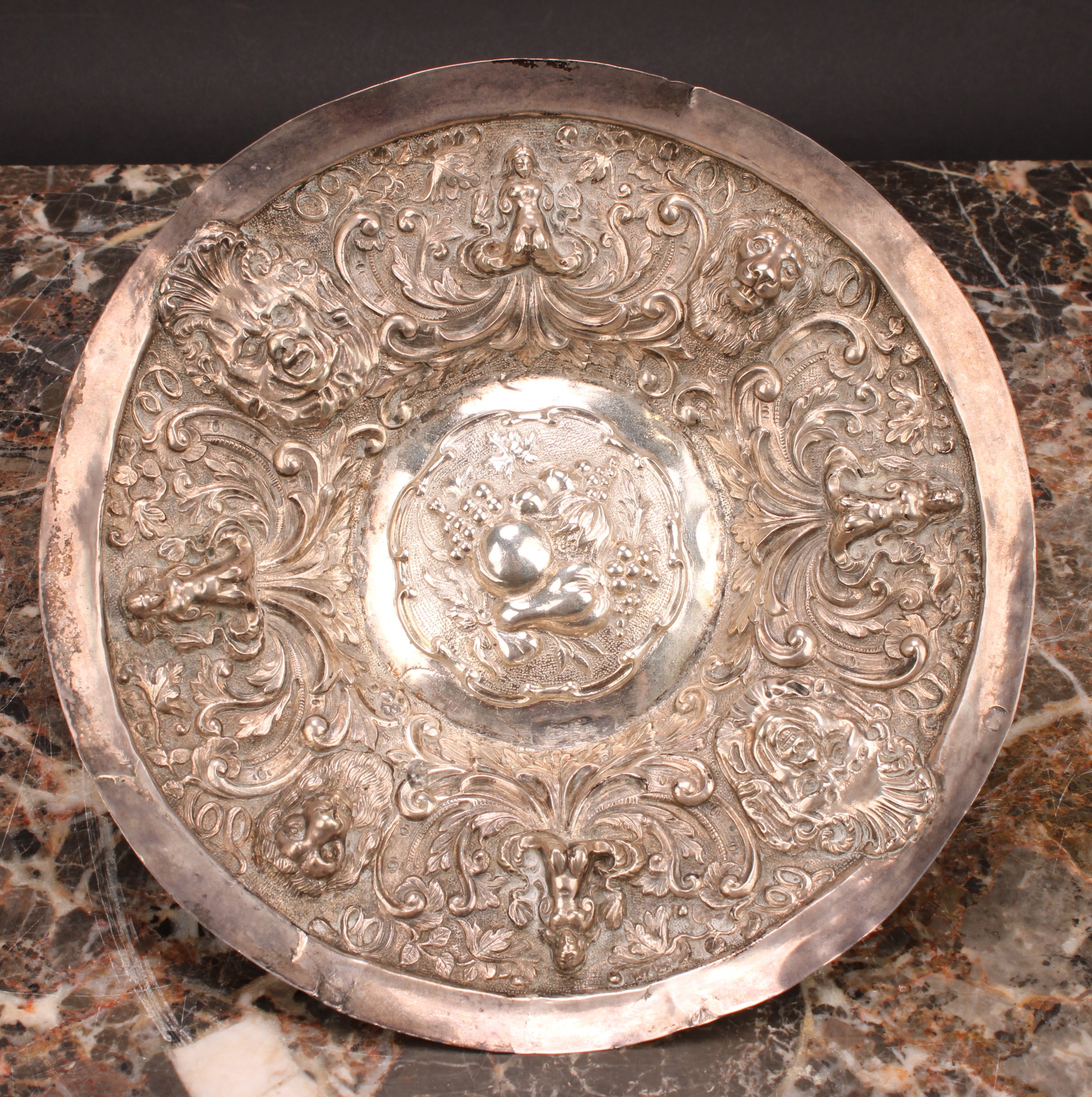 A Continental silver dish, probably German, repousse chased with mermaids, and lion and grotesque - Image 3 of 3