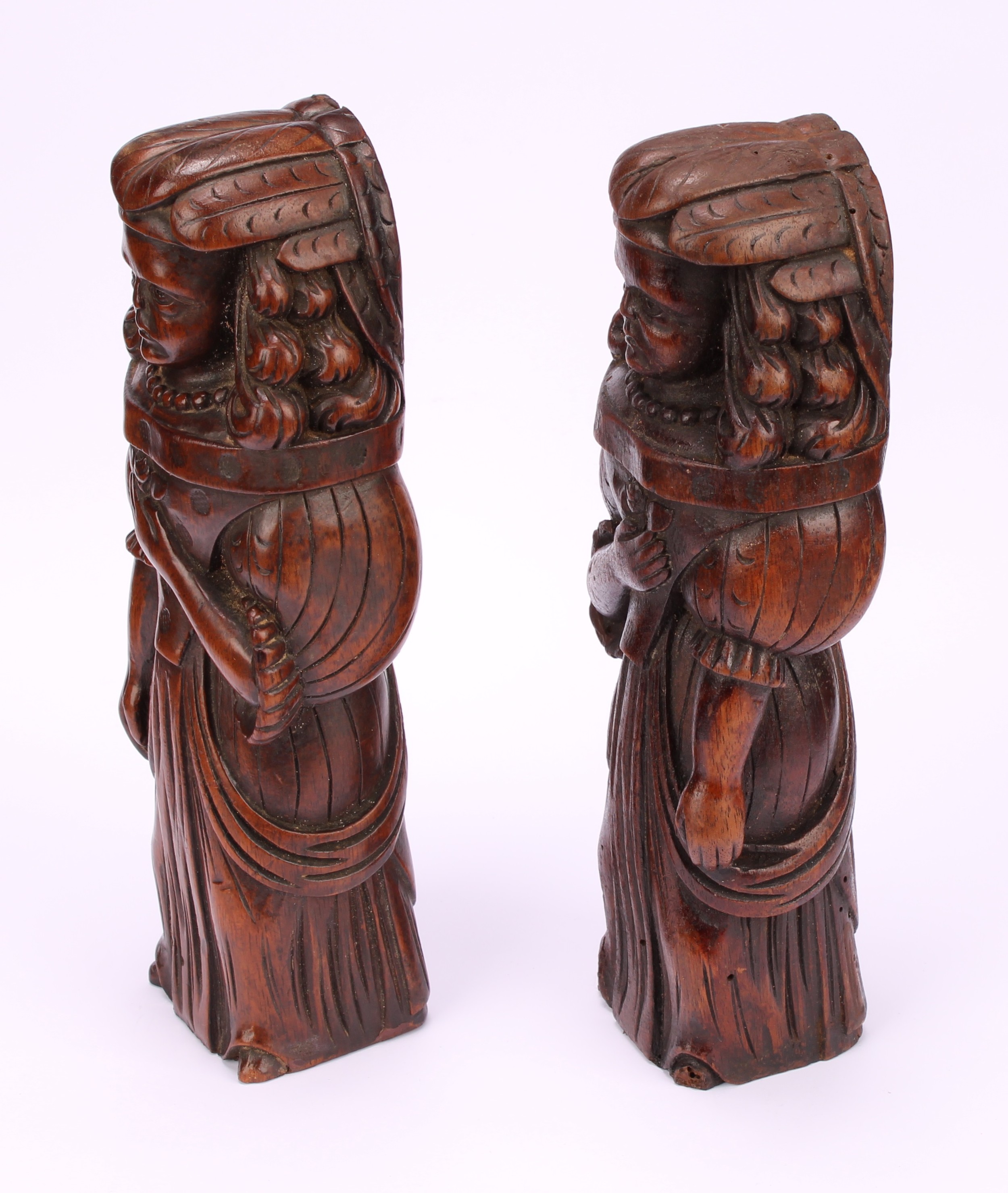 A pair of Continental walnut appliques, each carved as a lady of the court holding a flower to her - Image 4 of 4
