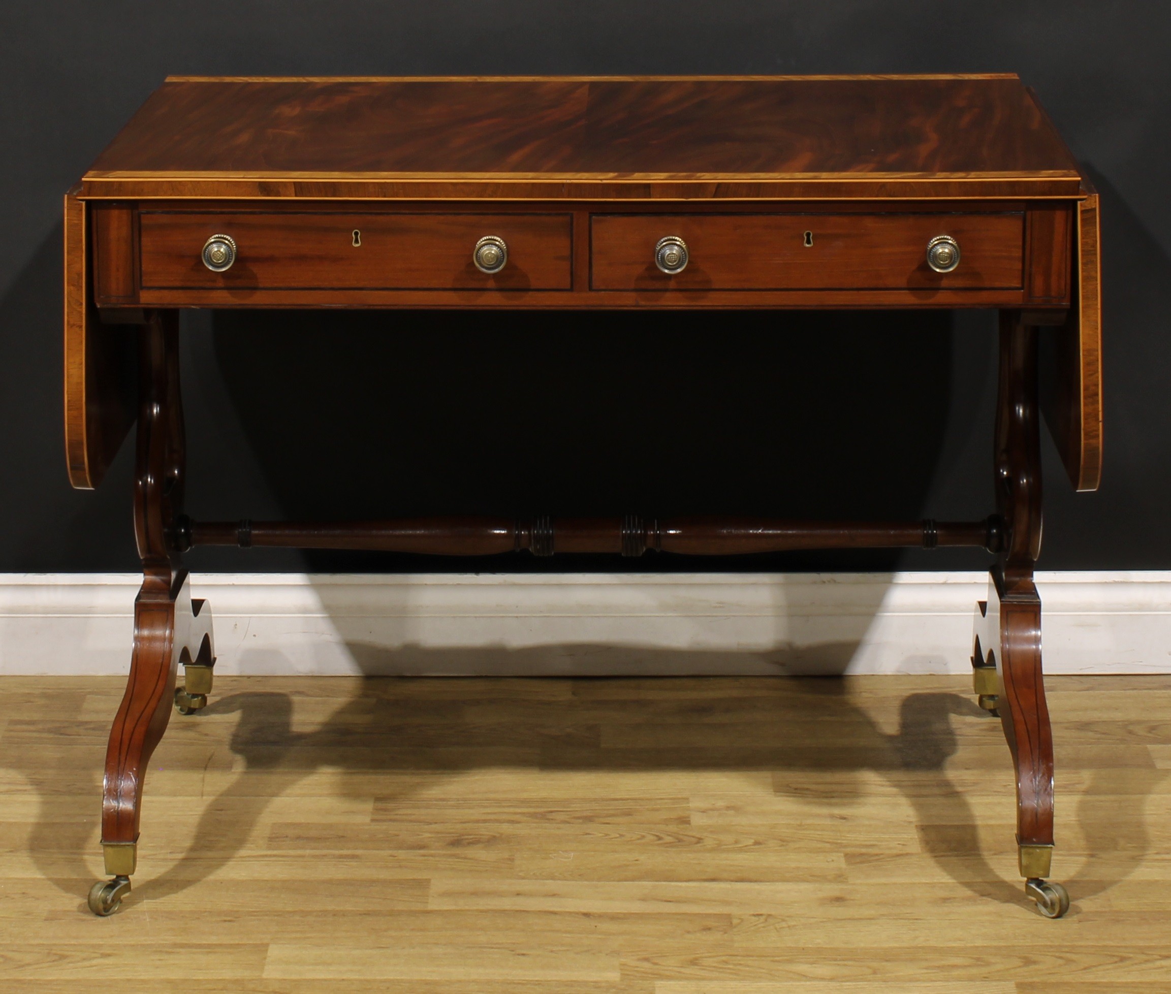 A Regency mahogany sofa table, rosewood crossbanded satinwood banded rounded rectangular top with - Image 6 of 6