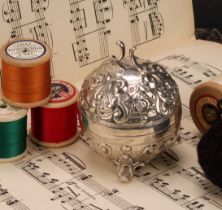 A Victorian silver globular string box, chased with flowers and leafy scrolls, 8cm high, Deakin &