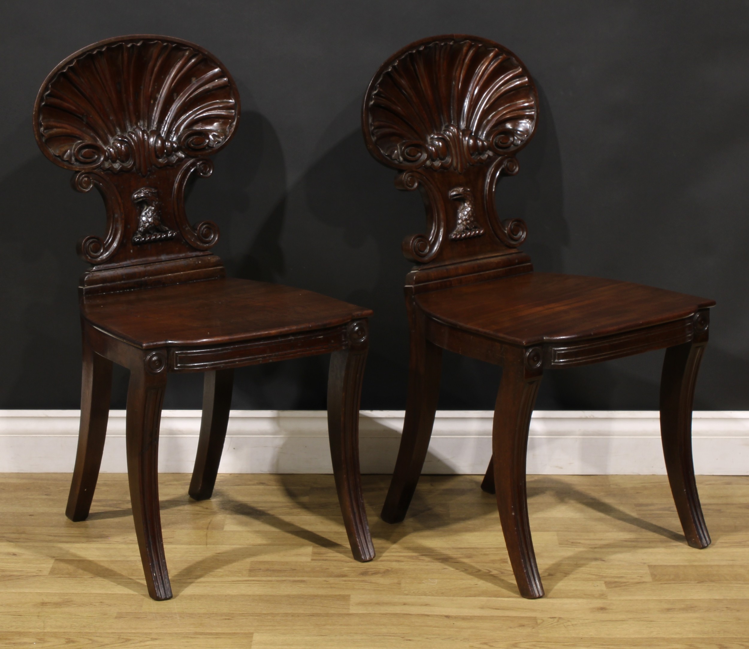A pair of Post-Regency mahogany hall chairs, in the manner of Gillows of Lancaster and London, - Image 2 of 4
