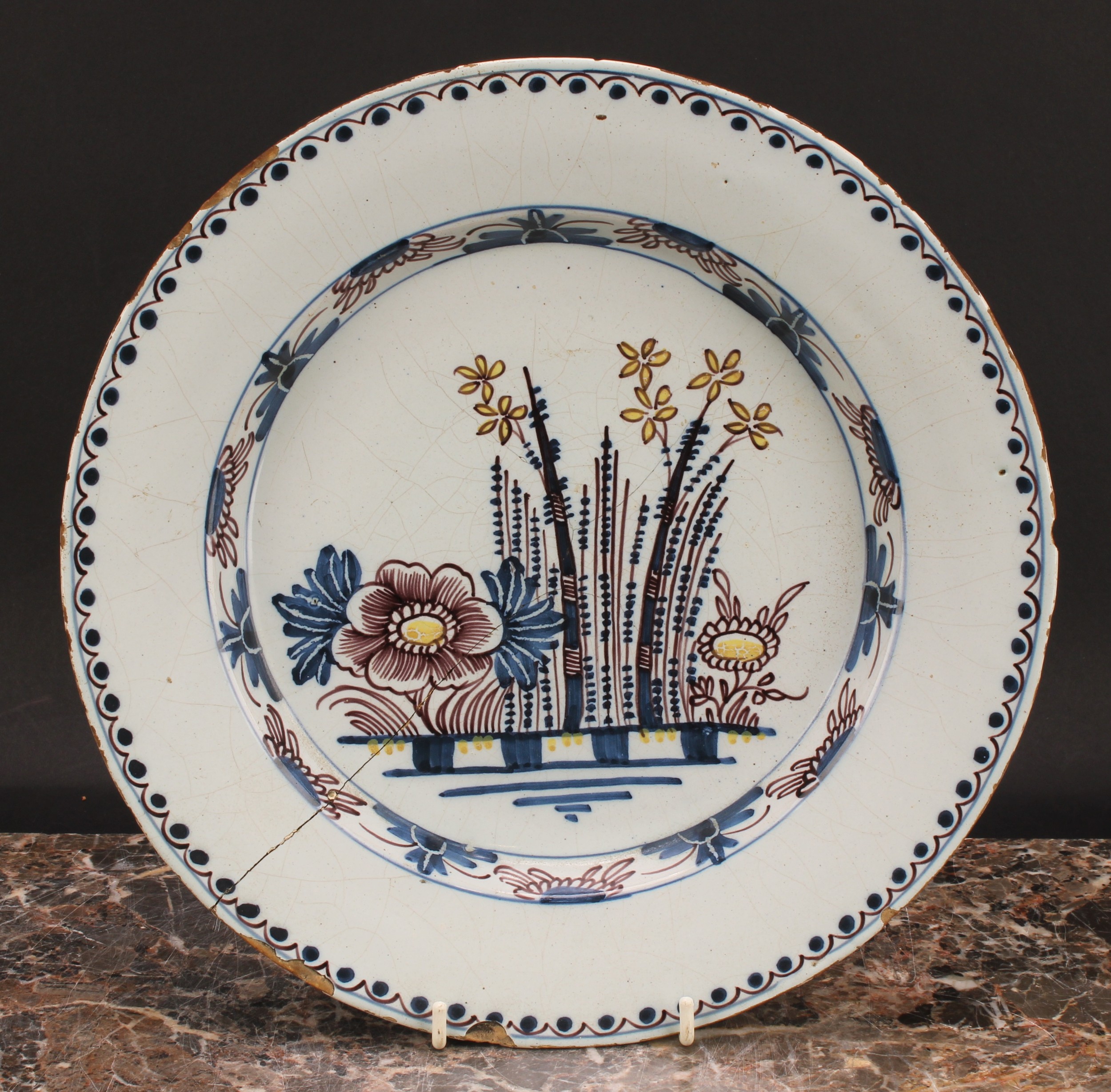 An 18th century English Delft charger, painted in underglaze blue with chinoiserie buildings, - Image 4 of 4