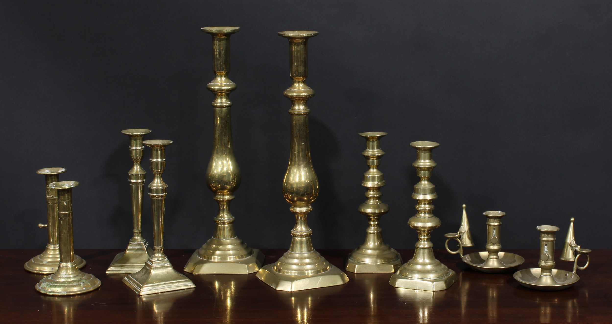 A pair of large Victorian brass baluster candlesticks, canted square bases, 41cm high, c.1880;